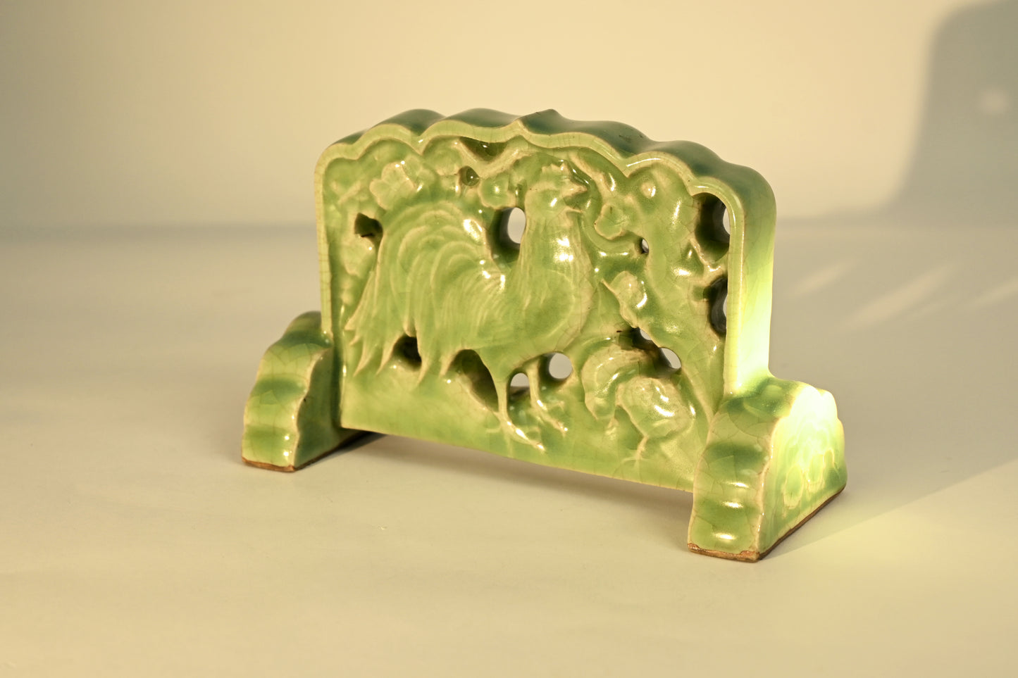 A Longquan Celadon "Rooster, Hen and Chicks" Table Screen, 19th Century