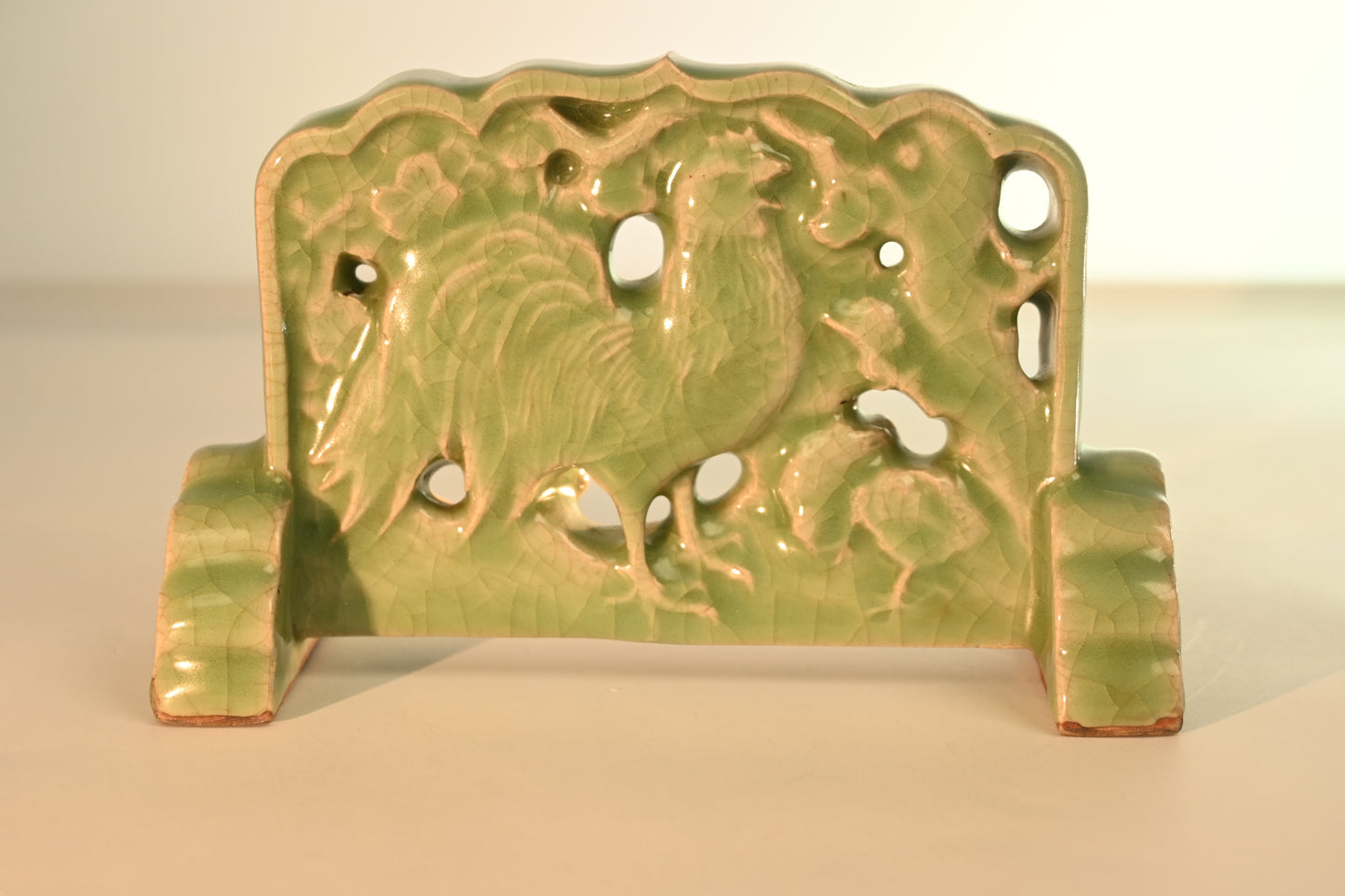 A Longquan Celadon "Rooster, Hen and Chicks" Table Screen, 19th Century
