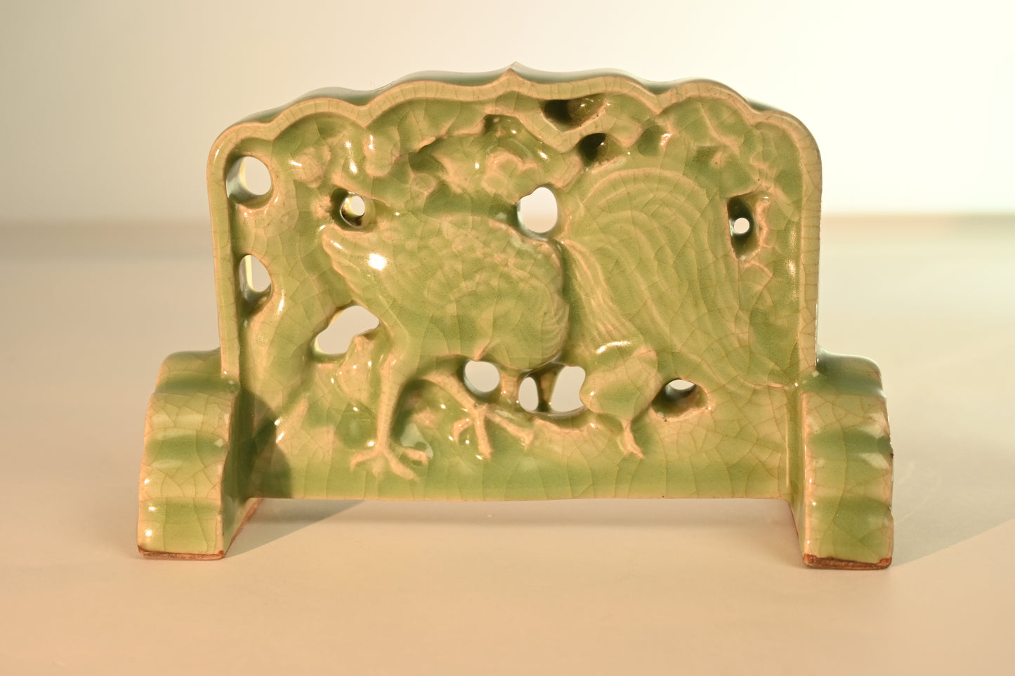 A Longquan Celadon "Rooster, Hen and Chicks" Table Screen, 19th Century