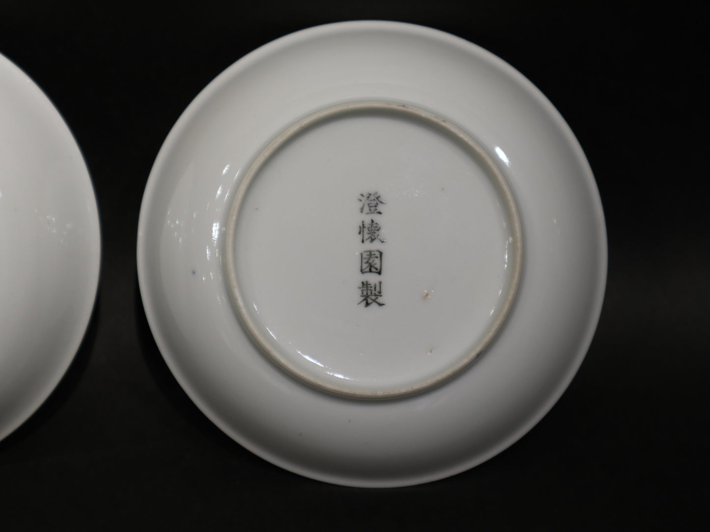 A pair of ink color landscape figure small dishes, Cheng Huai Yuan Zhi and Dai Xi Mark, Qianlong Period