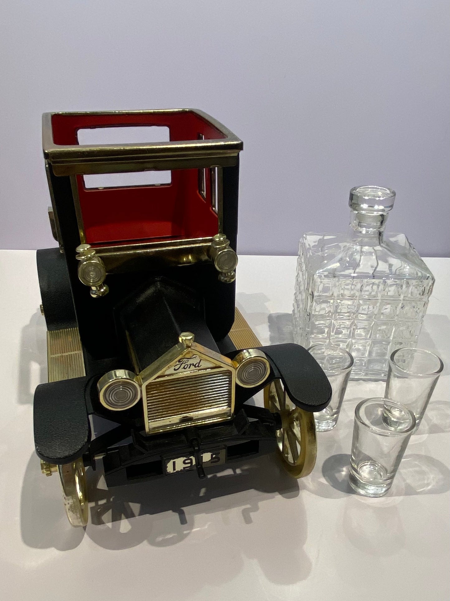 VINTAGE CAR DECANTER WITH SHOT GLASS AND HOLDER